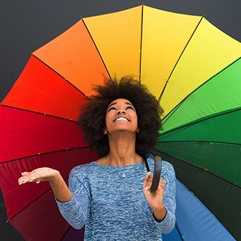 lady with a rainbow umbrella