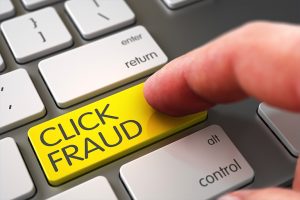 Finger clicking "Click Fraud" Google Adwords button